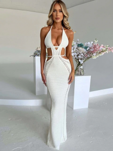 Hugcitar Crochet Halter Sleeveless Backless Solid Hollow Out Bandage Sexy Slim Maxi Prom Dress 2022 Winter Festival Party Outfit